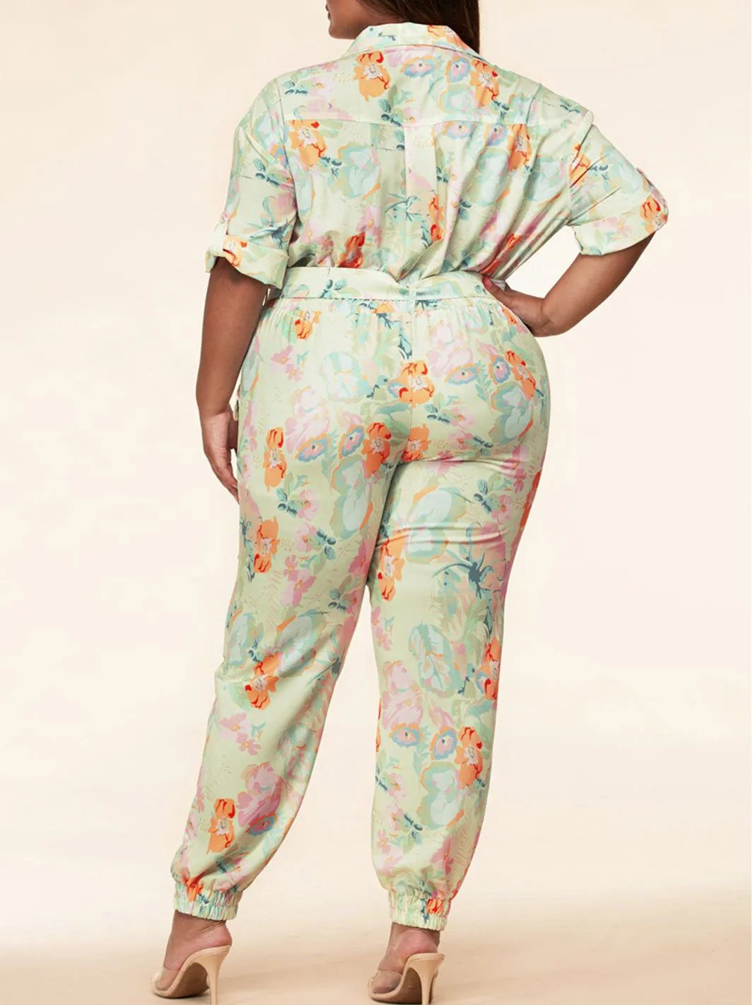PLUS SIZE SHORT SLEEVE BUTTON UP FLORAL BELTED JUMPSUIT